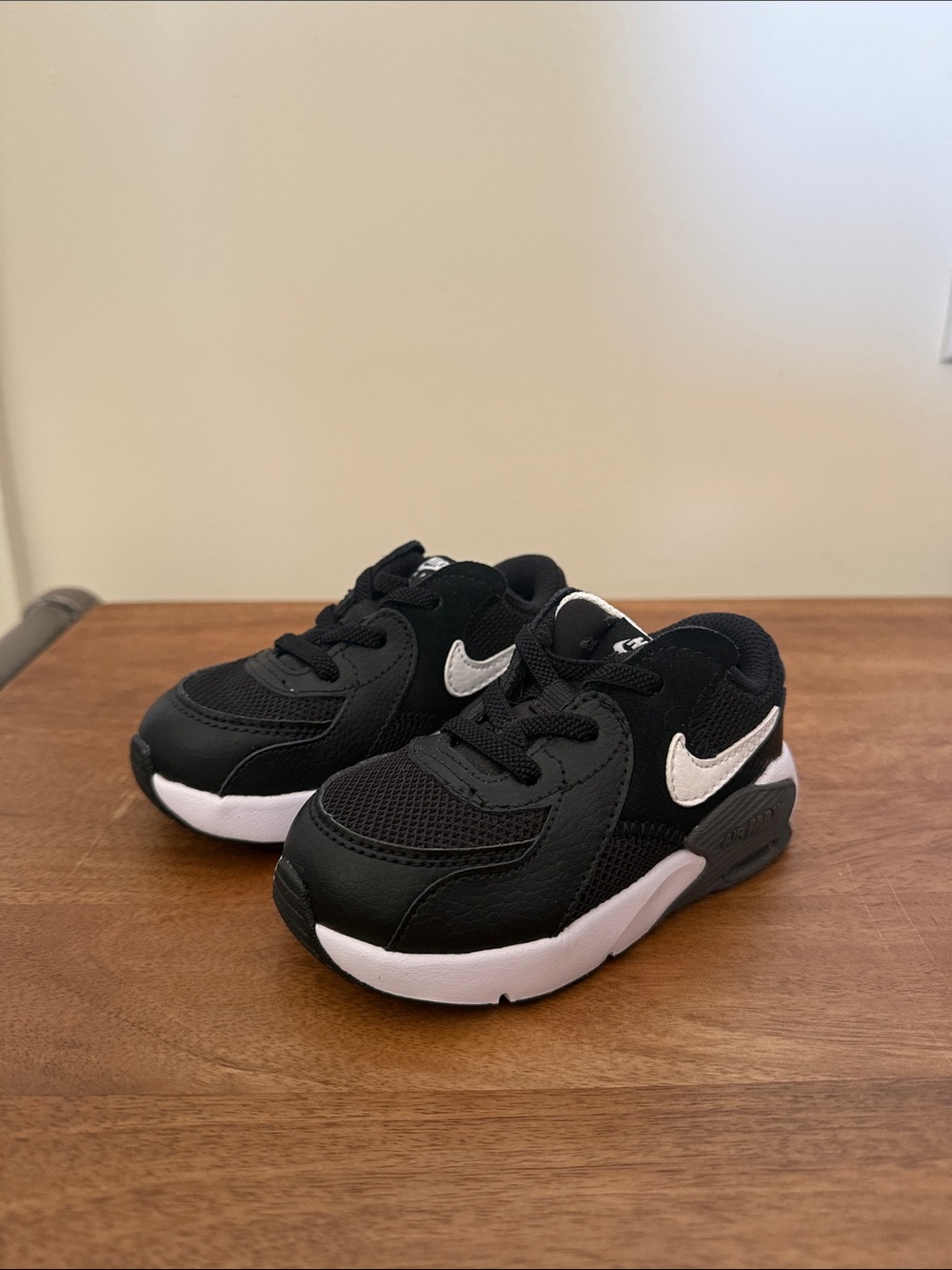 Nike Kids Black Sneakers with White Swoosh